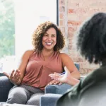 happy woman on couch