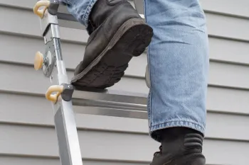 Image of someone climbing a ladder 